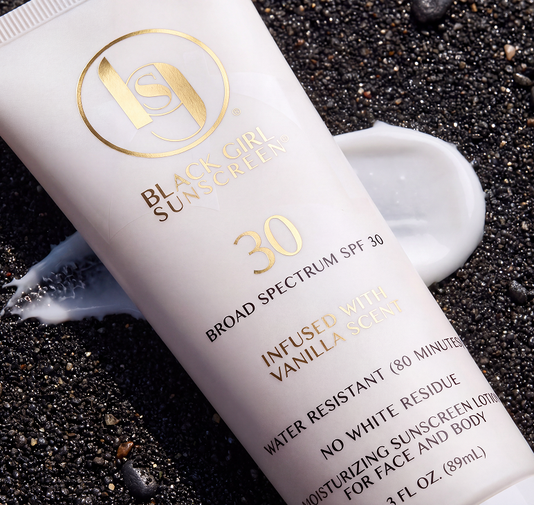 Black Girl Sunscreen SPF 30 vanilla sunscreen packaging with product texture